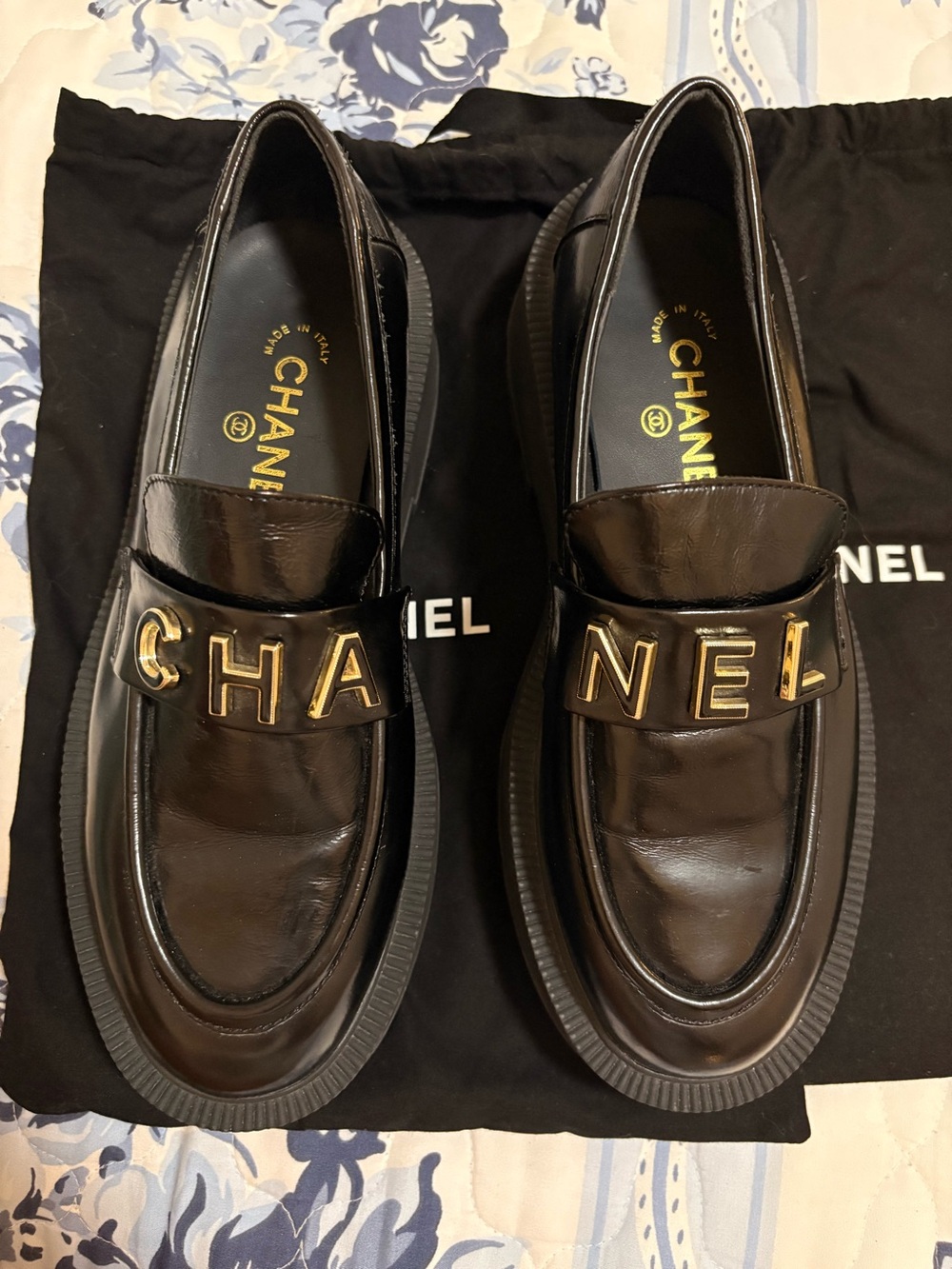 CHANEL Black Patent Leather Loafers with Gold Logo Hardware